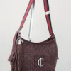Bolso Rimini Grand Charlotte Signature Choco Trenzado 7 Rimini Grand color chocolate uso al hombro piel trenzada