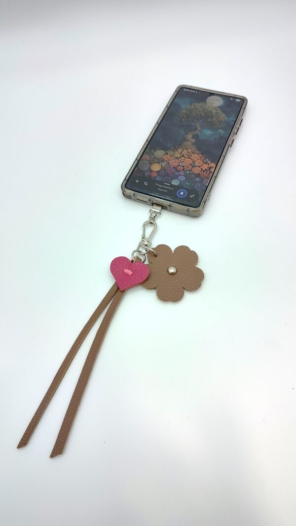 IMG_20260402_184730319_HDR Charm Muñequera para Móvil