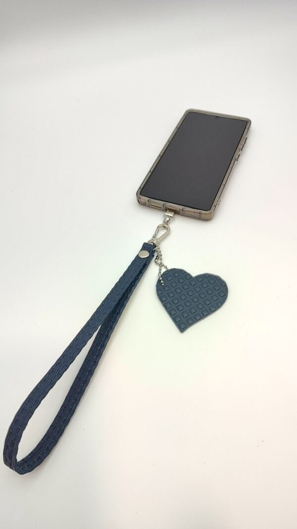 IMG_20260402_185849807_HDR Charm Muñequera para Móvil